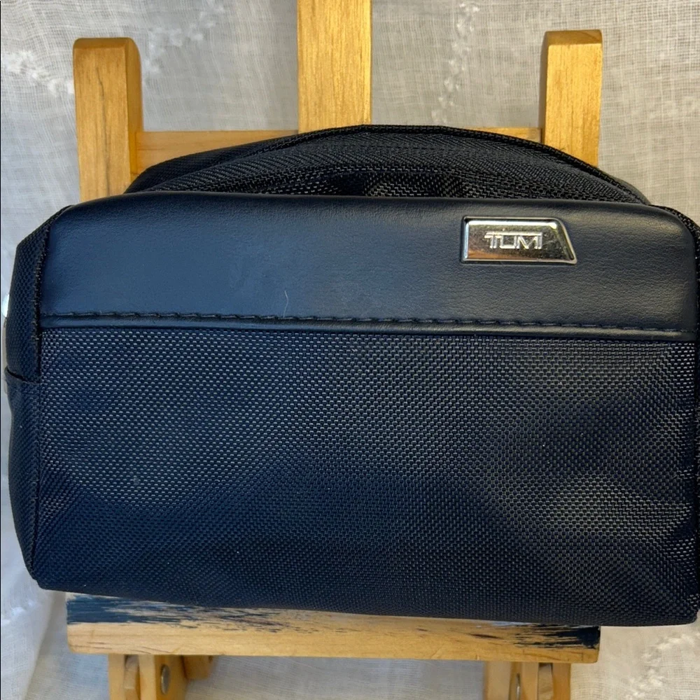 Tumi NWT cosmetic travel bag filled with goodies all new in packages